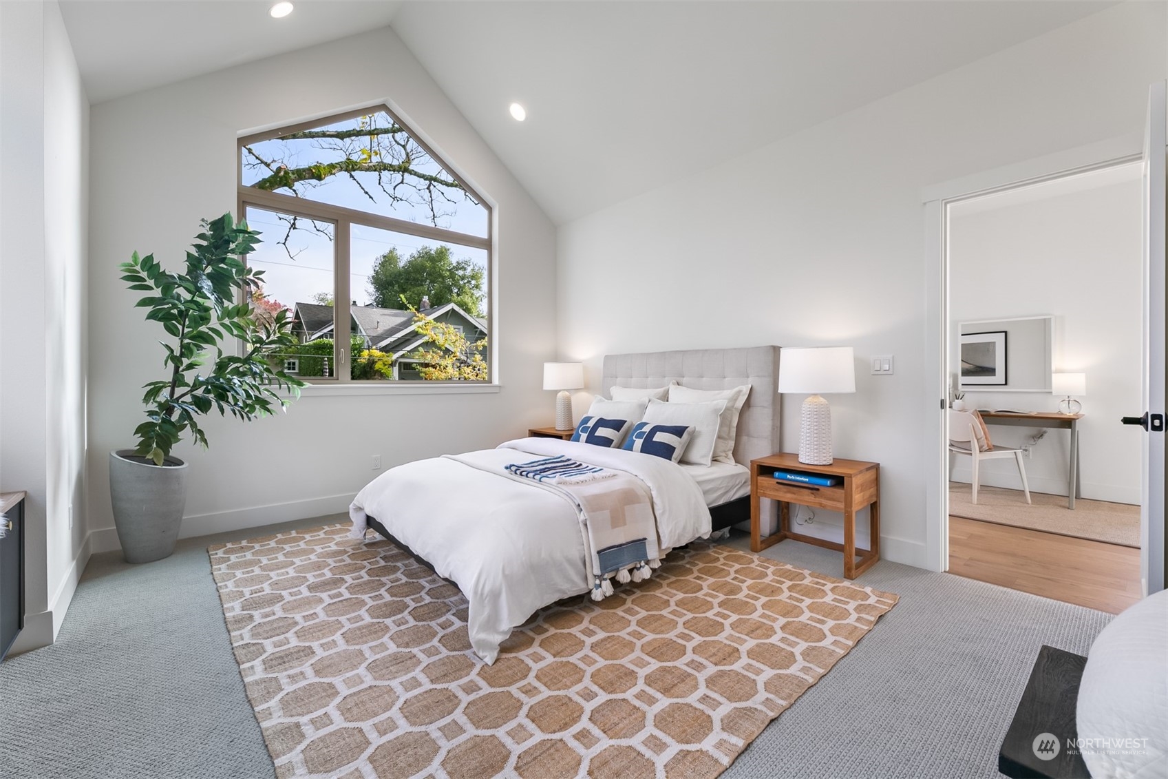 3207 37th Place South Seattle, WA 98144 - Photo 13 of 38 a bedroom with a bed and a window
