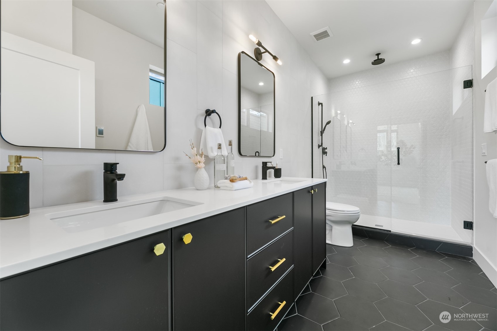 3207 37th Place South Seattle, WA 98144 - Photo 15 of 38 a bathroom with a double vanity sink mirror double and bathtub