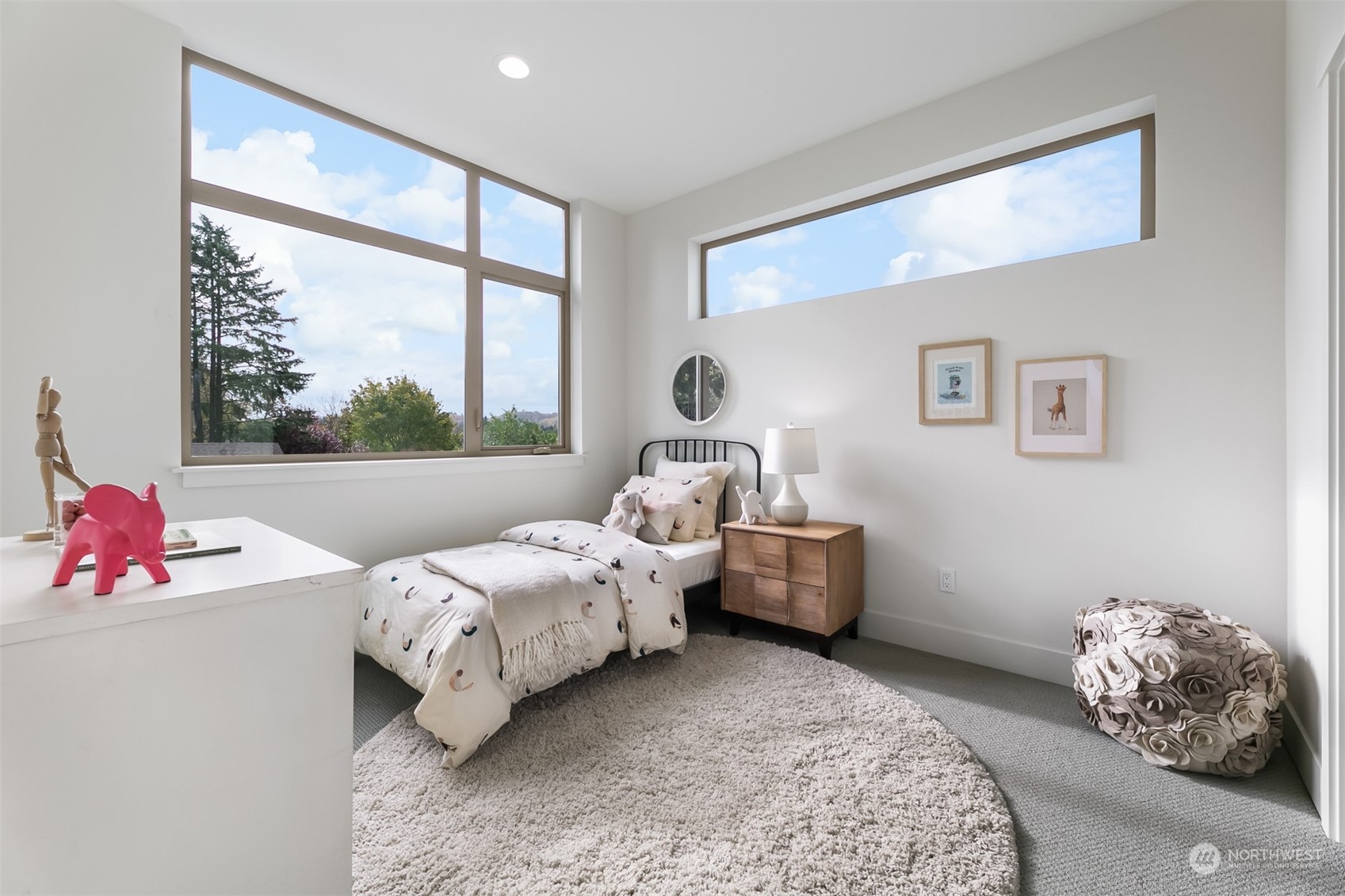 3207 37th Place South Seattle, WA 98144 - Photo 18 of 38 a bedroom with bed and a large window