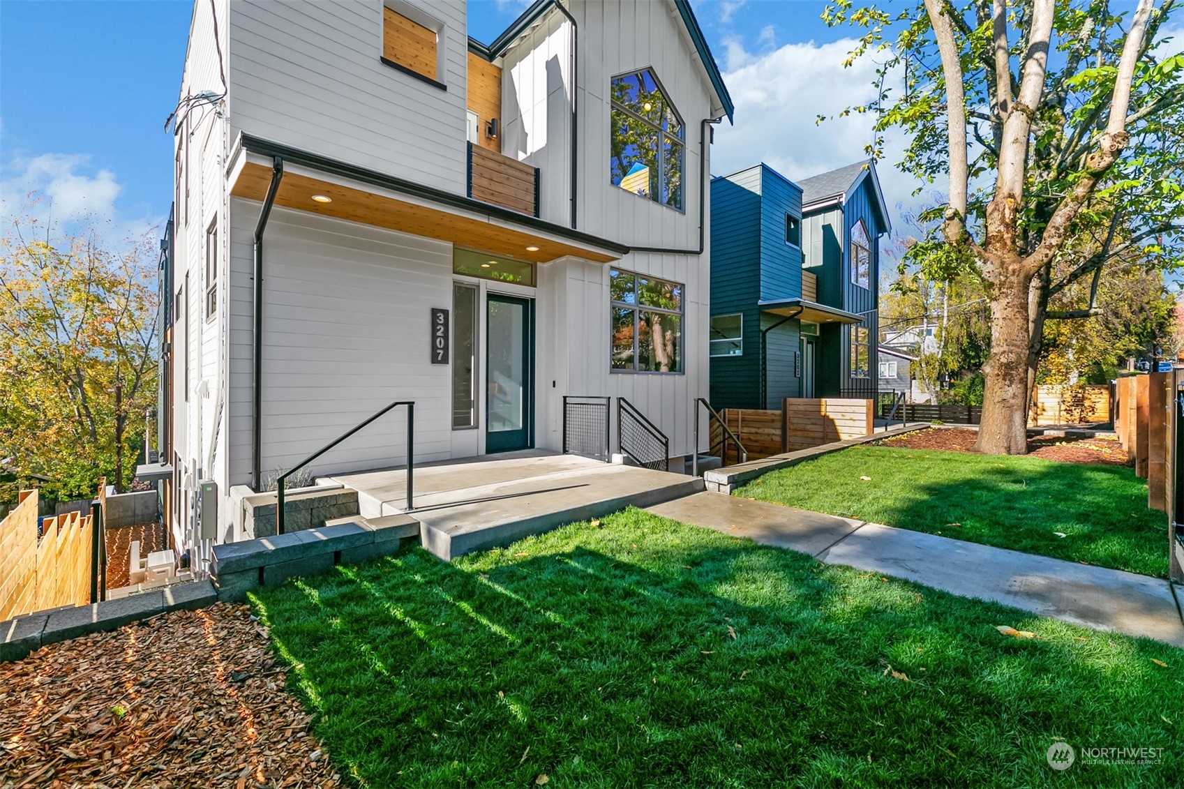 3207 37th Place South Seattle, WA 98144 - Photo 33 of 38 a view of a house with a yard and sitting area