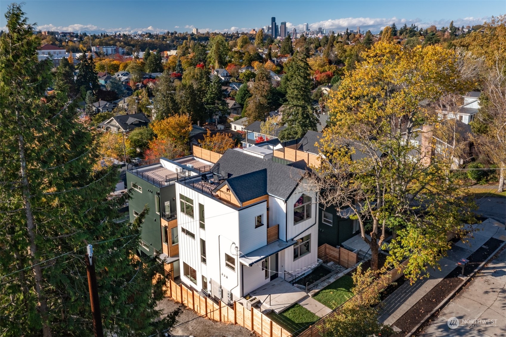 3207 37th Place South Seattle, WA 98144 - Photo 36 of 38 an aerial view of multiple houses with a yard