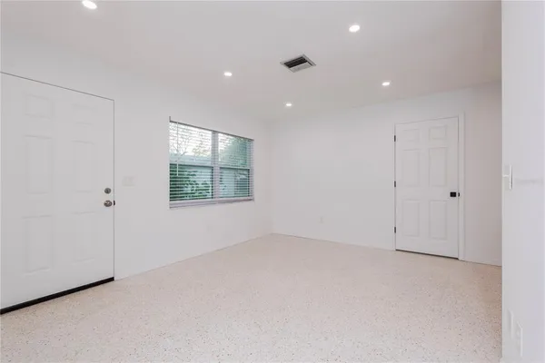 an empty room with windows