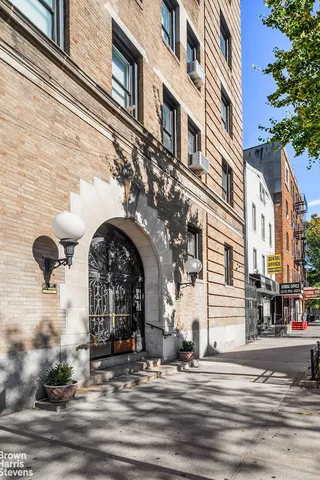 a view of a building with a street