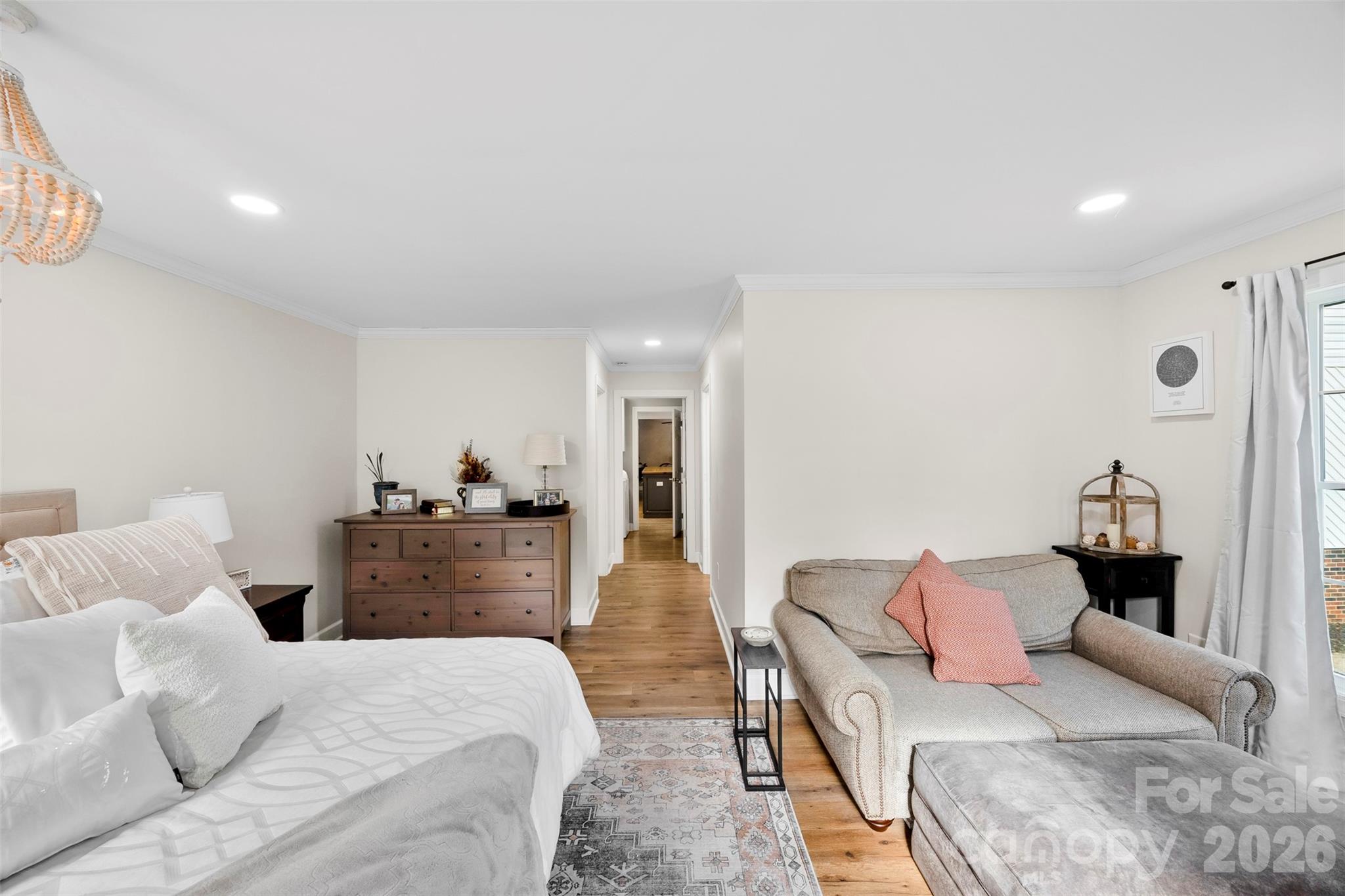 123 Chestnut Ridge Road Kings Mountain, NC 28086 - Photo 12 of 36 a bedroom with a bed and wooden floor