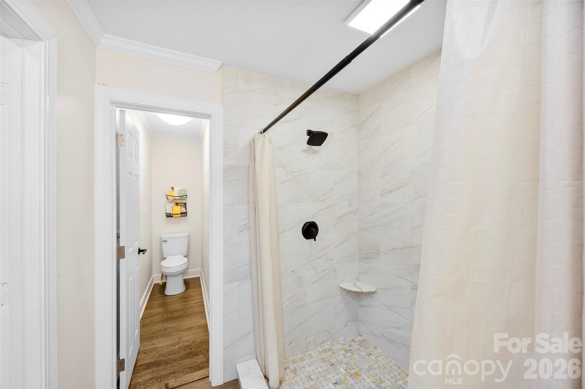 123 Chestnut Ridge Road Kings Mountain, NC 28086 - Photo 15 of 36 a bathroom with a granite countertop shower and a toilet
