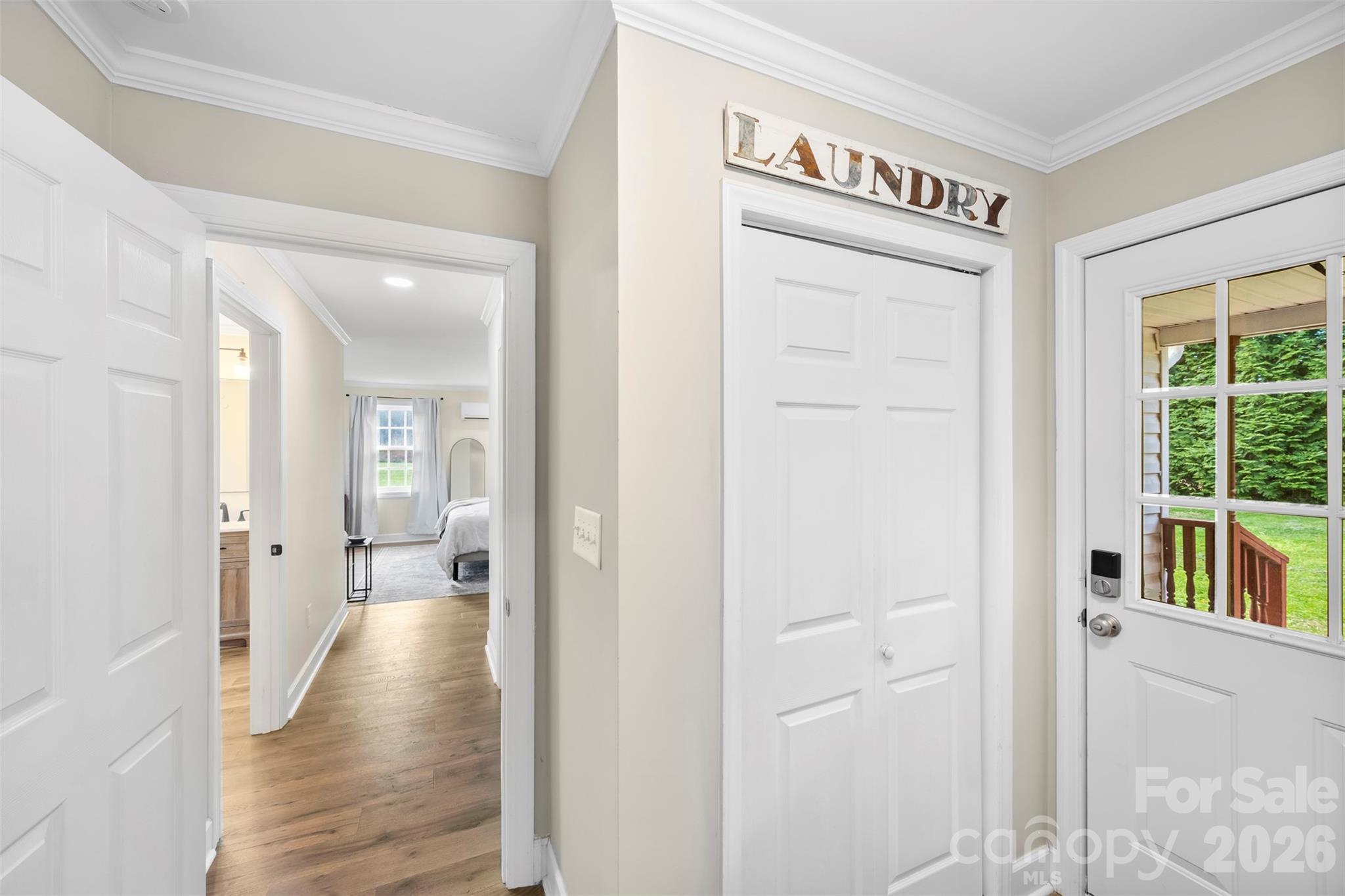 123 Chestnut Ridge Road Kings Mountain, NC 28086 - Photo 16 of 36 a view of a hallway with wooden floor and windows