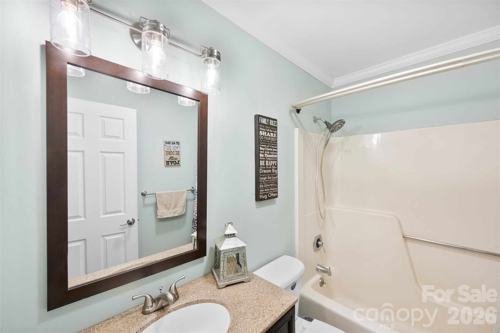123 Chestnut Ridge Road Kings Mountain, NC 28086 - Photo 24 of 36 a bathroom with a granite countertop sink mirror toilet and bathtub