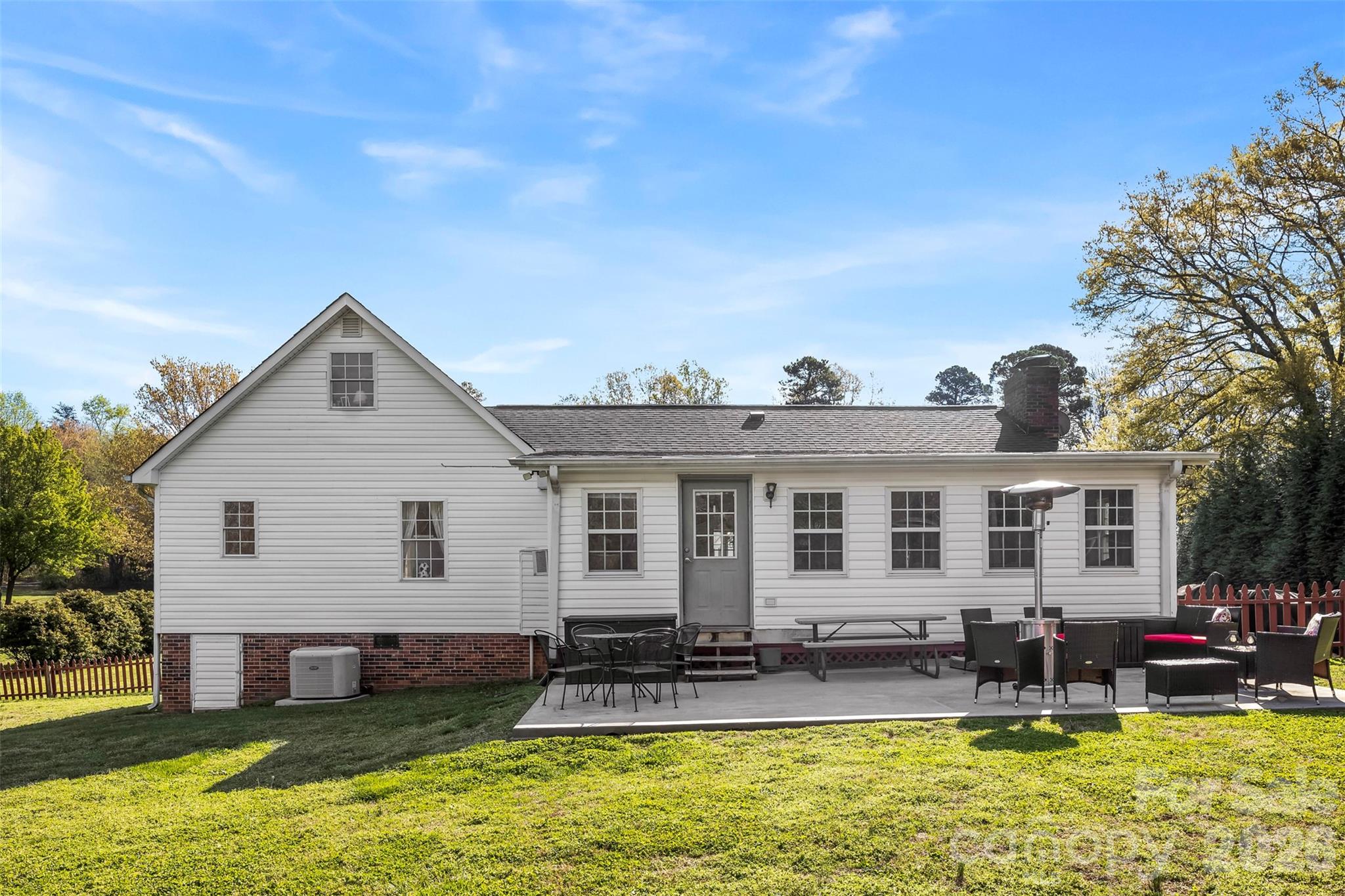 123 Chestnut Ridge Road Kings Mountain, NC 28086 - Photo 33 of 36 a view of a house with swimming pool and a yard