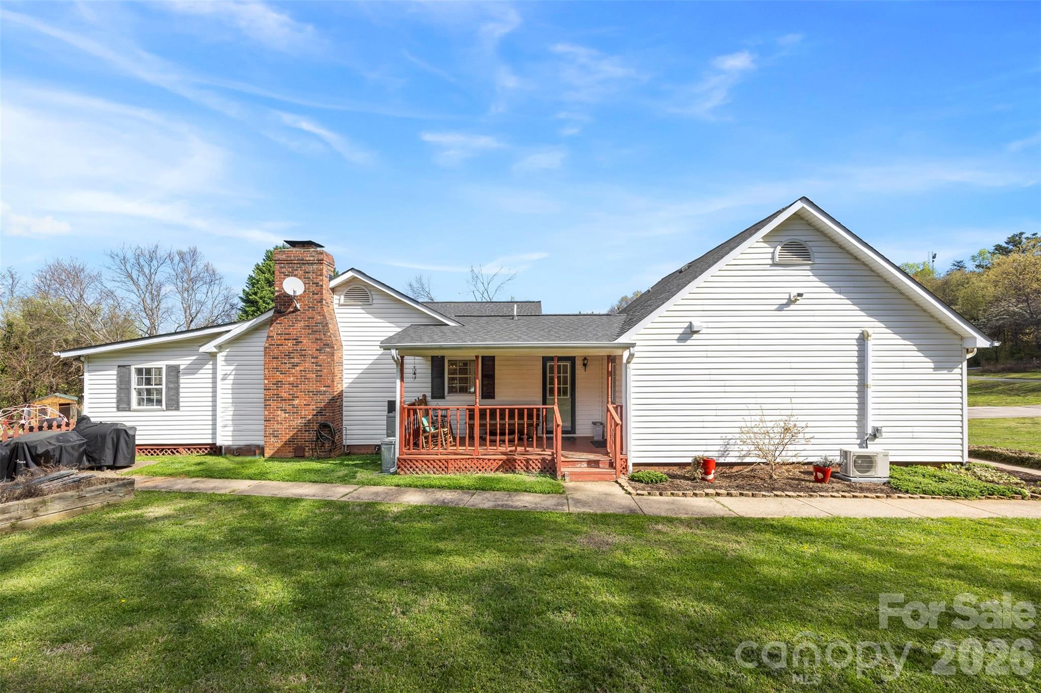 123 Chestnut Ridge Road Kings Mountain, NC 28086 - Photo 35 of 36 a front view of house with yard and outdoor seating