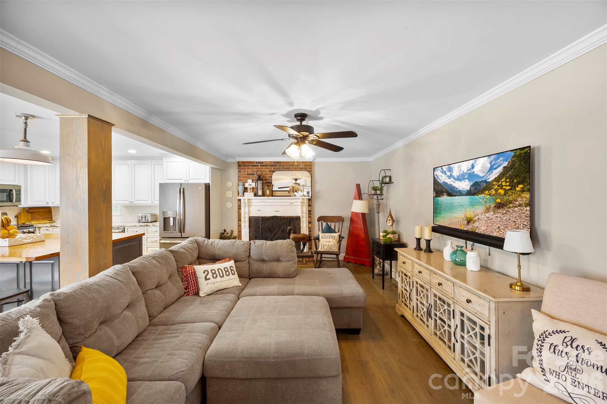 123 Chestnut Ridge Road Kings Mountain, NC 28086 - Photo 8 of 36 a living room with furniture and a flat screen tv