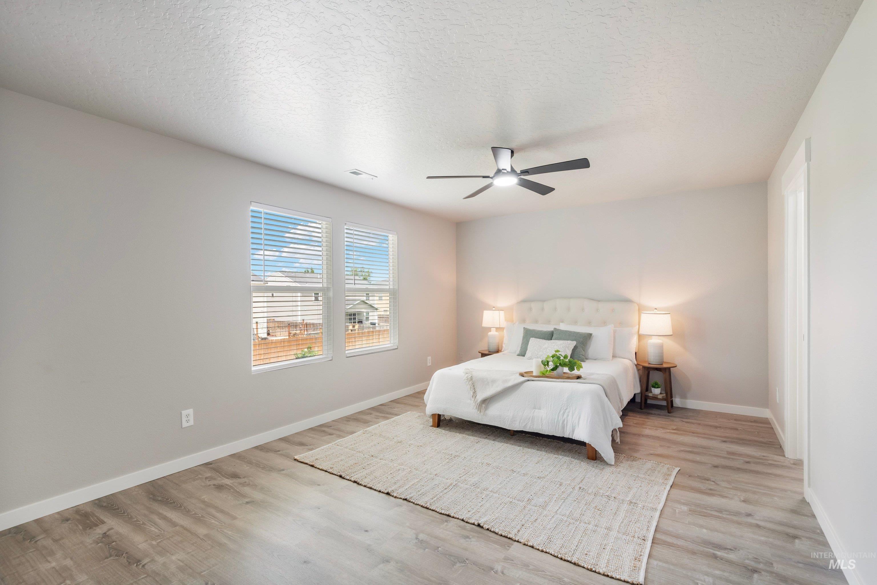 16759 Abram Avenue Caldwell, ID 83607 - Photo 16 of 33 Spacious room featuring light wood-finish flooring and neutral wall tones