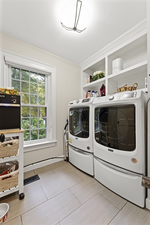 16 Preacher Road, Unit 16 Milton, MA 02186 - Photo 18 of 32 a utility room with dryer and washer