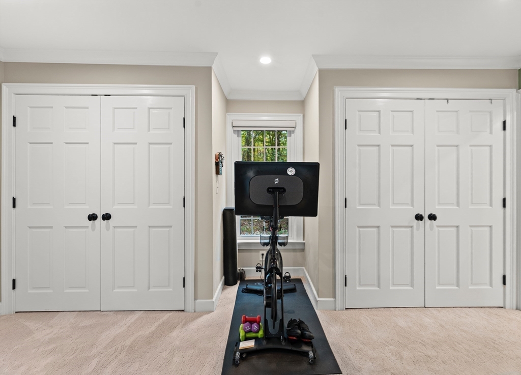 16 Preacher Road, Unit 16 Milton, MA 02186 - Photo 26 of 32 a view of a livingroom with wooden floor and furniture