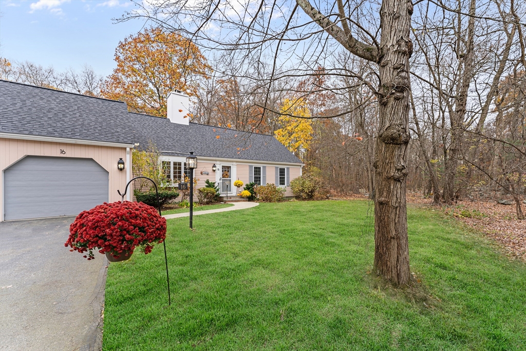 16 Preacher Road, Unit 16 Milton, MA 02186 - Photo 3 of 32 a front view of a house with garden