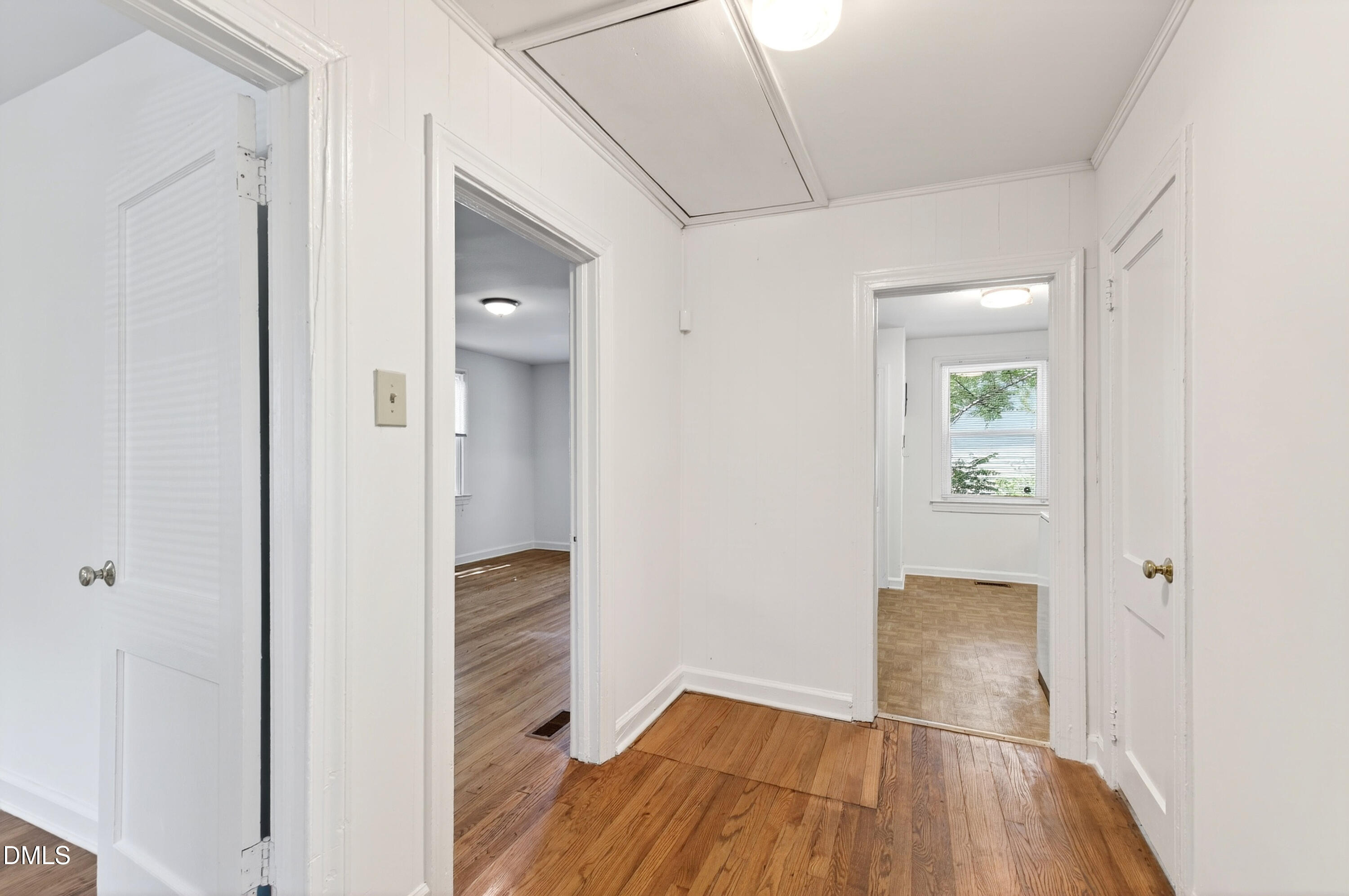 2316 Bedford Avenue Raleigh, NC 27607 - Photo 12 of 30 a view of hallway with bathroom and wooden floor