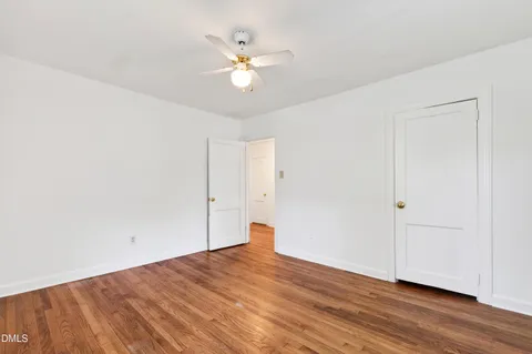 a bathroom with a sink toilet and a mirror