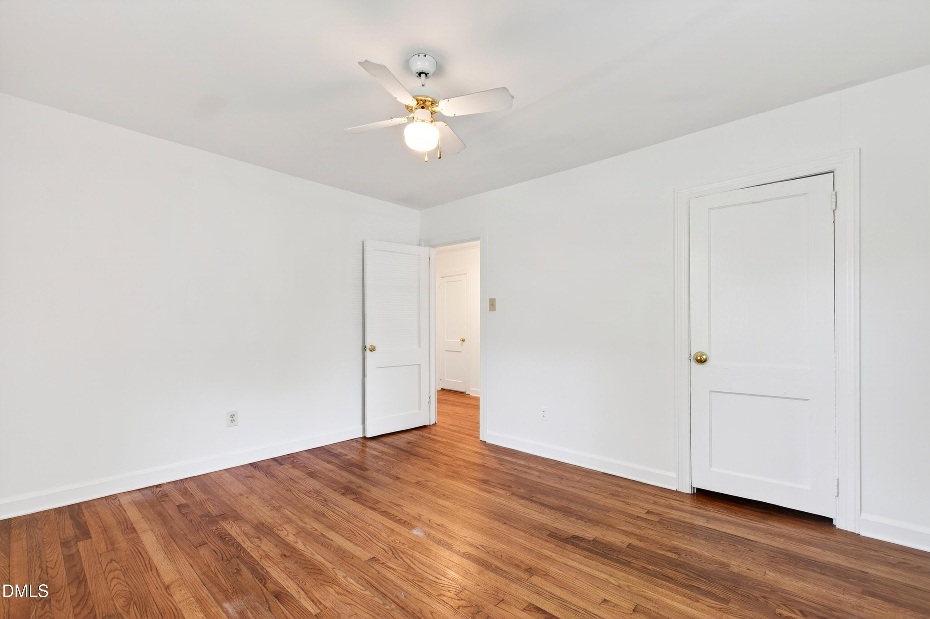 2316 Bedford Avenue Raleigh, NC 27607 - Photo 15 of 30 a view of an empty room with wooden floor