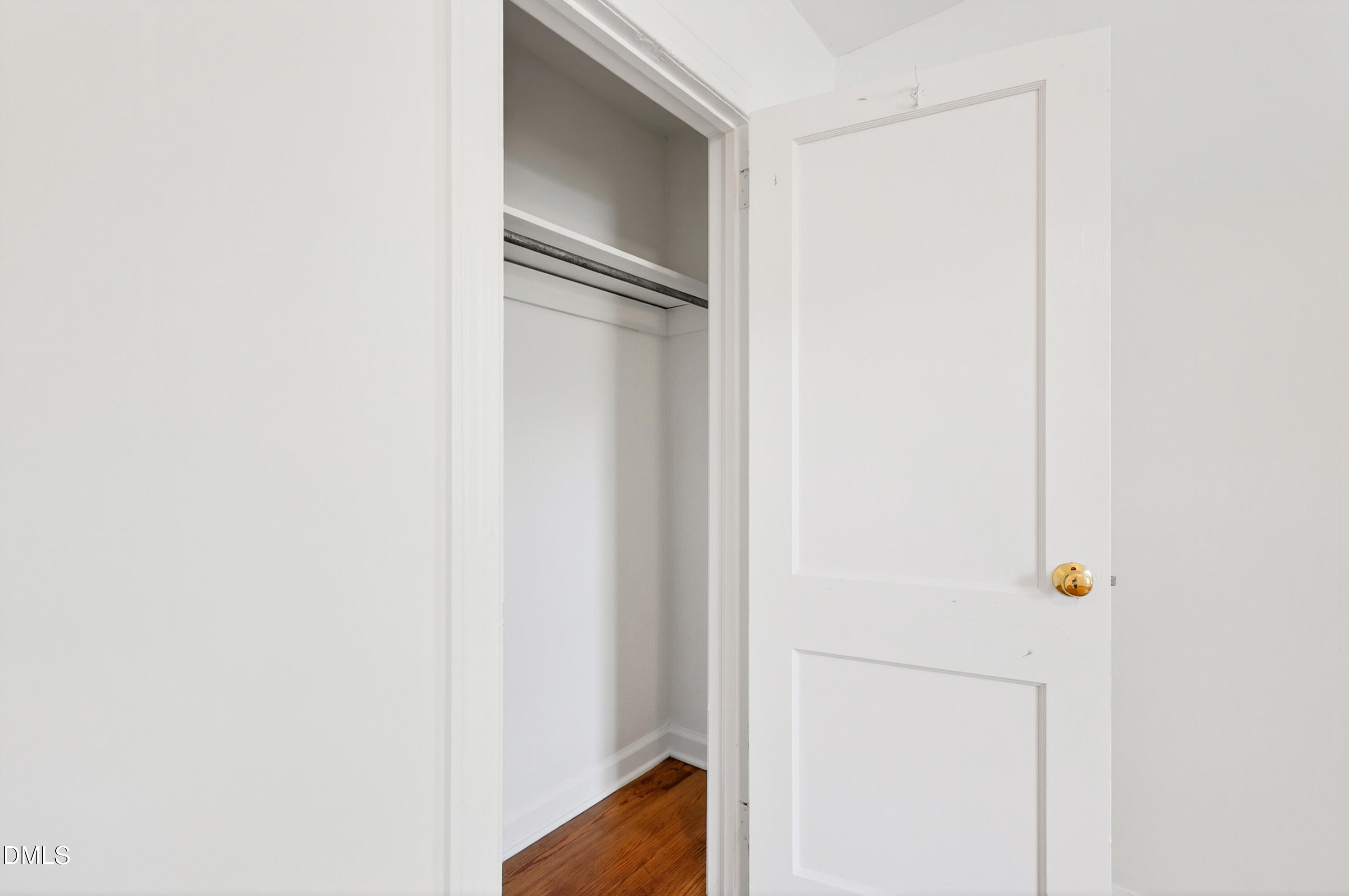 2316 Bedford Avenue Raleigh, NC 27607 - Photo 17 of 30 a view of walk in closet with empty racks