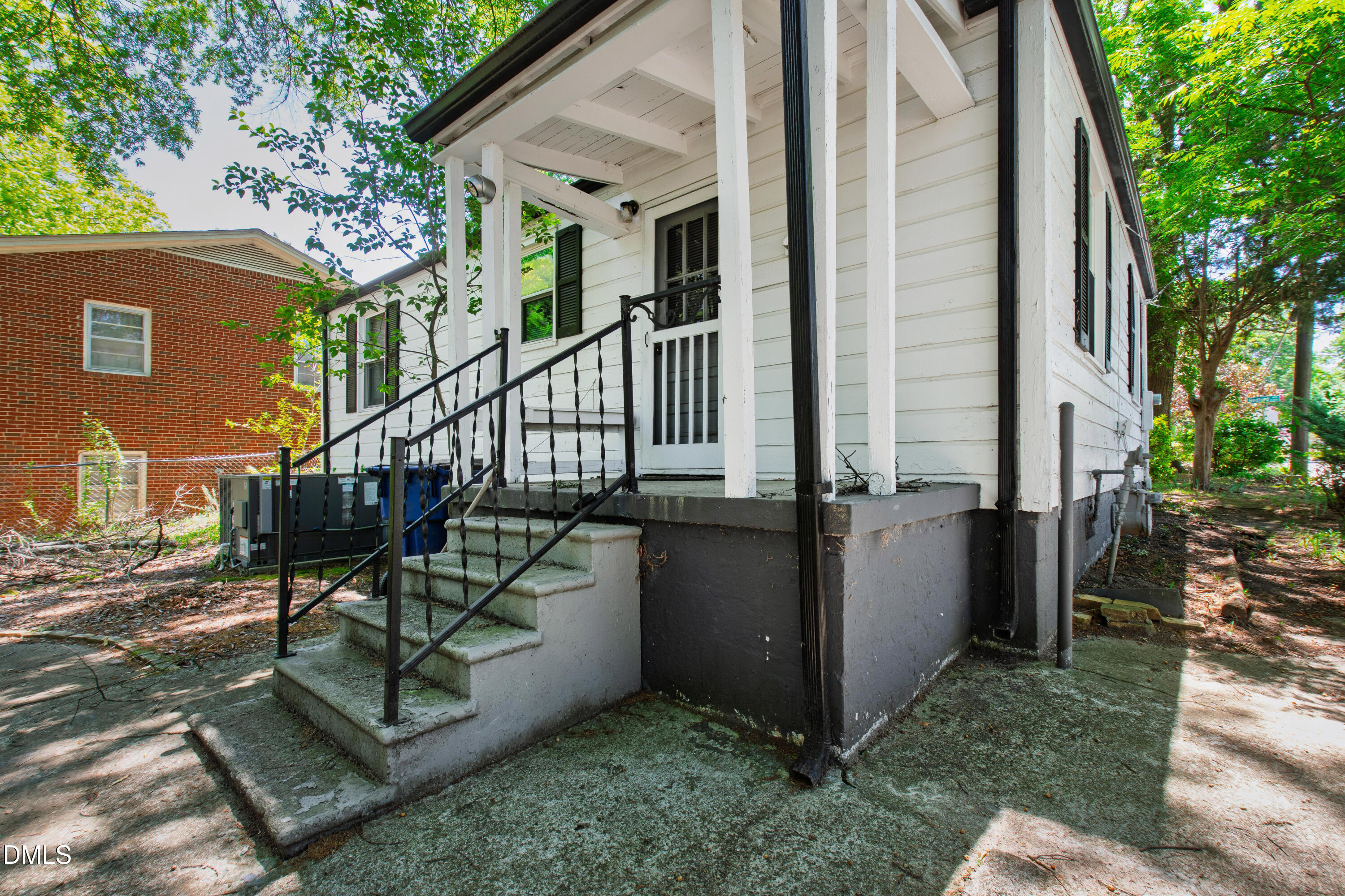 2316 Bedford Avenue Raleigh, NC 27607 - Photo 23 of 30 a view of an house with backyard and trees