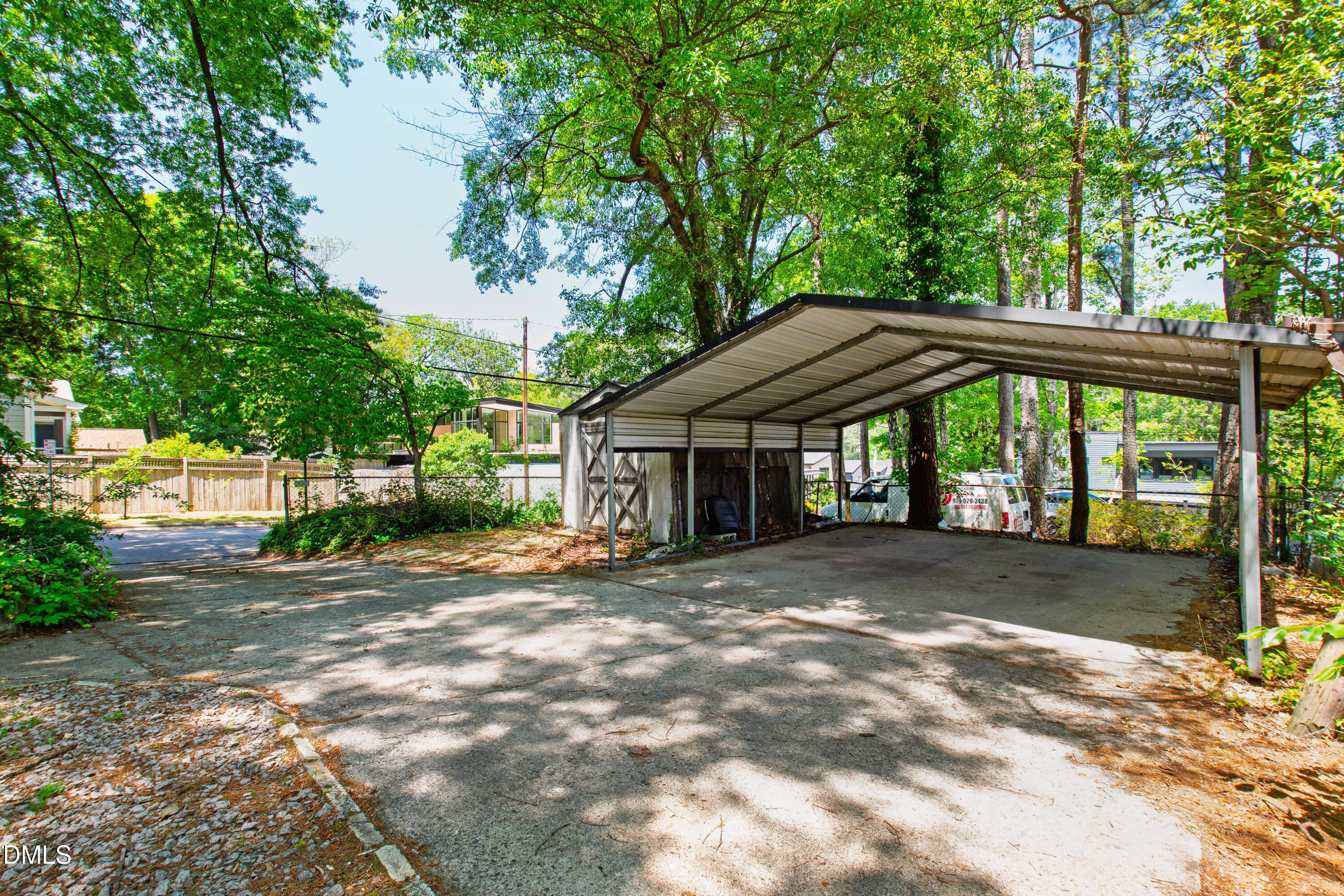 2316 Bedford Avenue Raleigh, NC 27607 - Photo 25 of 30 a front view of a house with a yard and trees