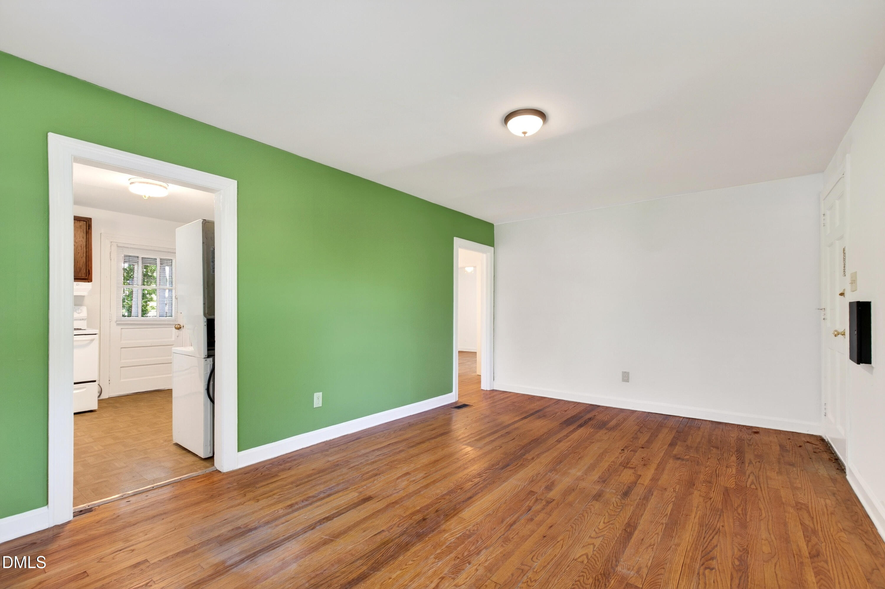 2316 Bedford Avenue Raleigh, NC 27607 - Photo 5 of 30 a view of room with window and wooden floor