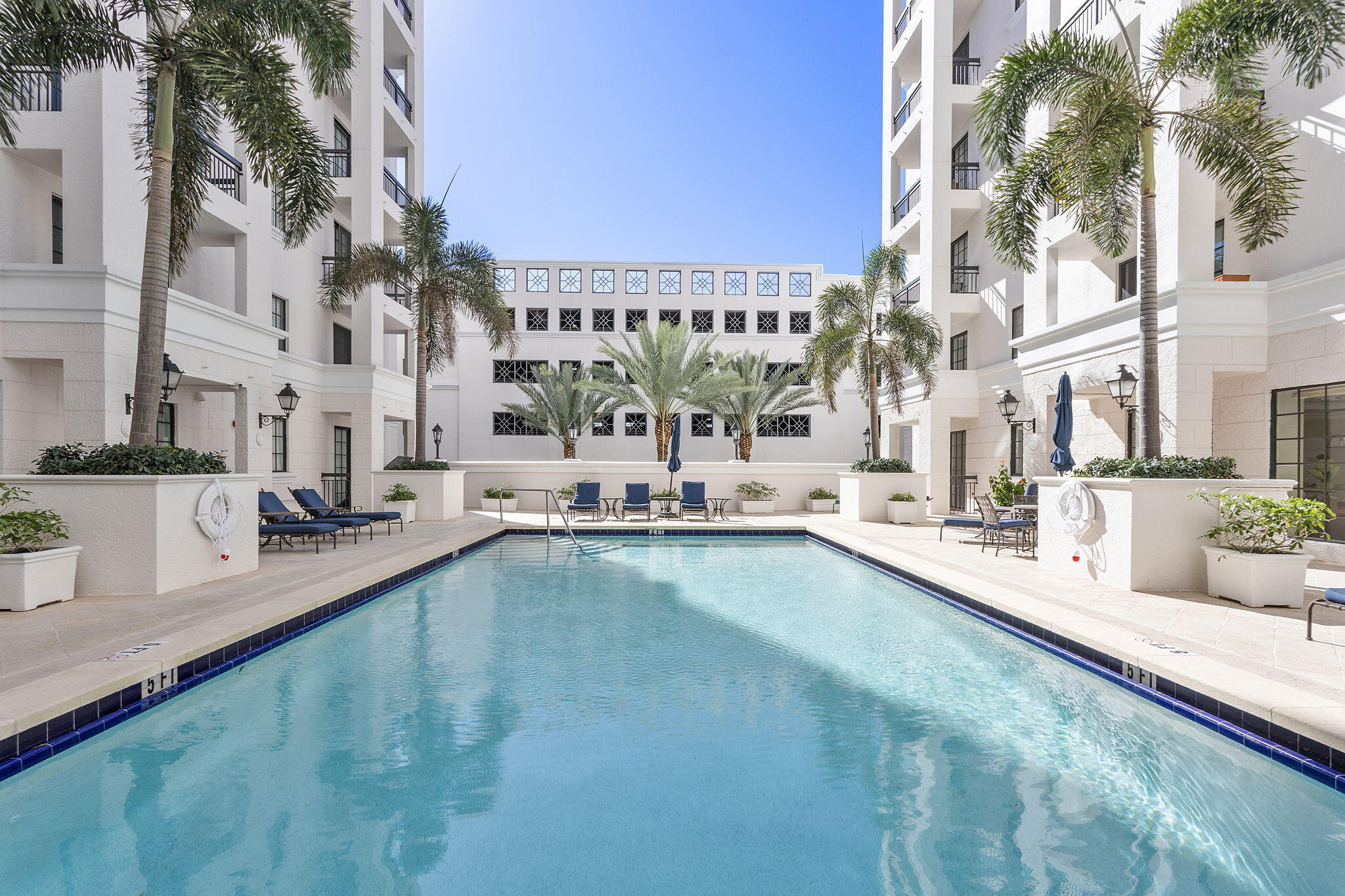 233 South Federal Highway, Unit 325 Boca Raton, FL 33432 - Photo 20 of 30 a view of a swimming pool with a patio