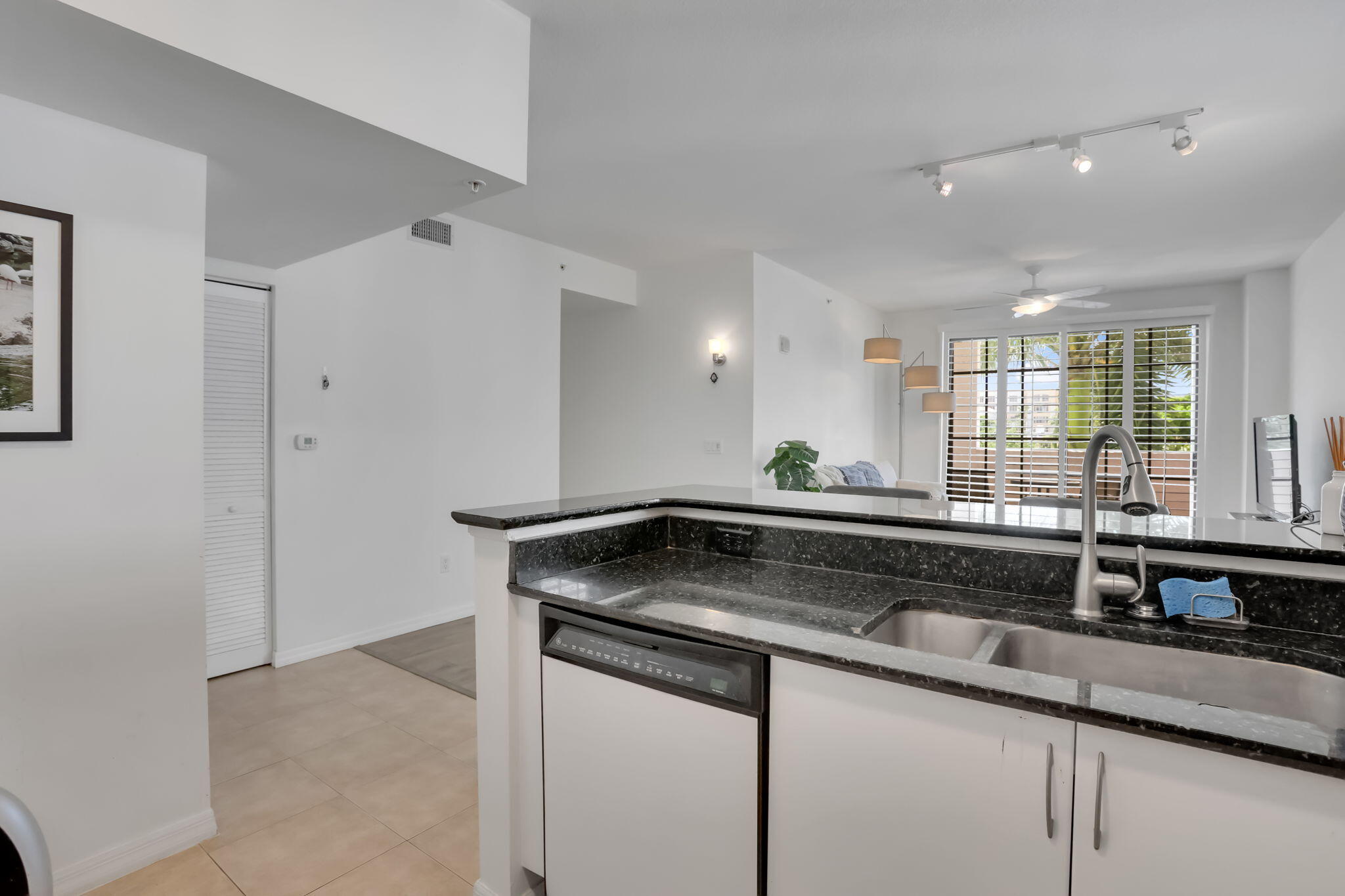 233 South Federal Highway, Unit 325 Boca Raton, FL 33432 - Photo 5 of 30 a kitchen with a sink and cabinets