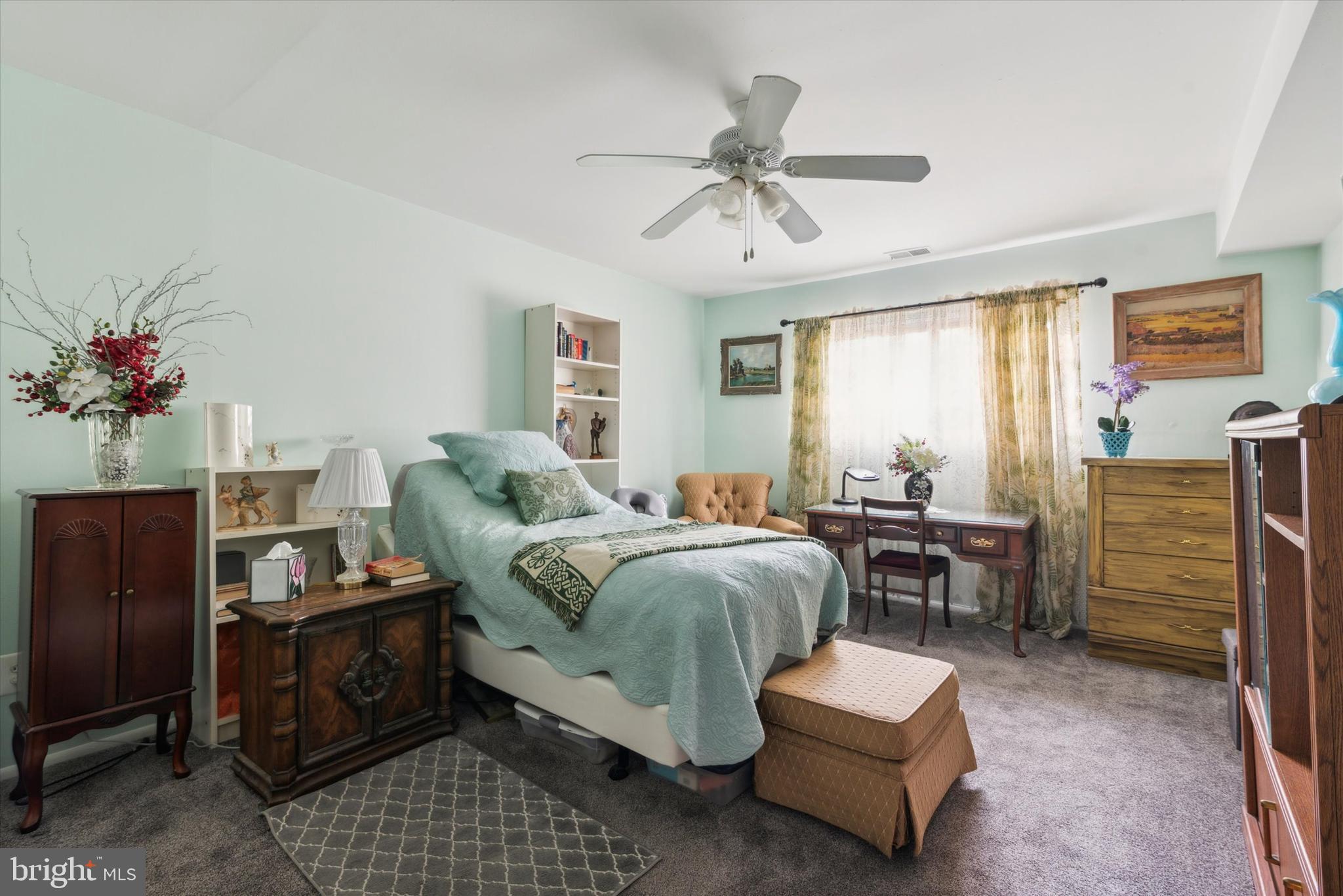 46 Township Line Road, Unit 209 Elkins Park, PA 19027 - Photo 13 of 15 a living room with furniture and wooden floor