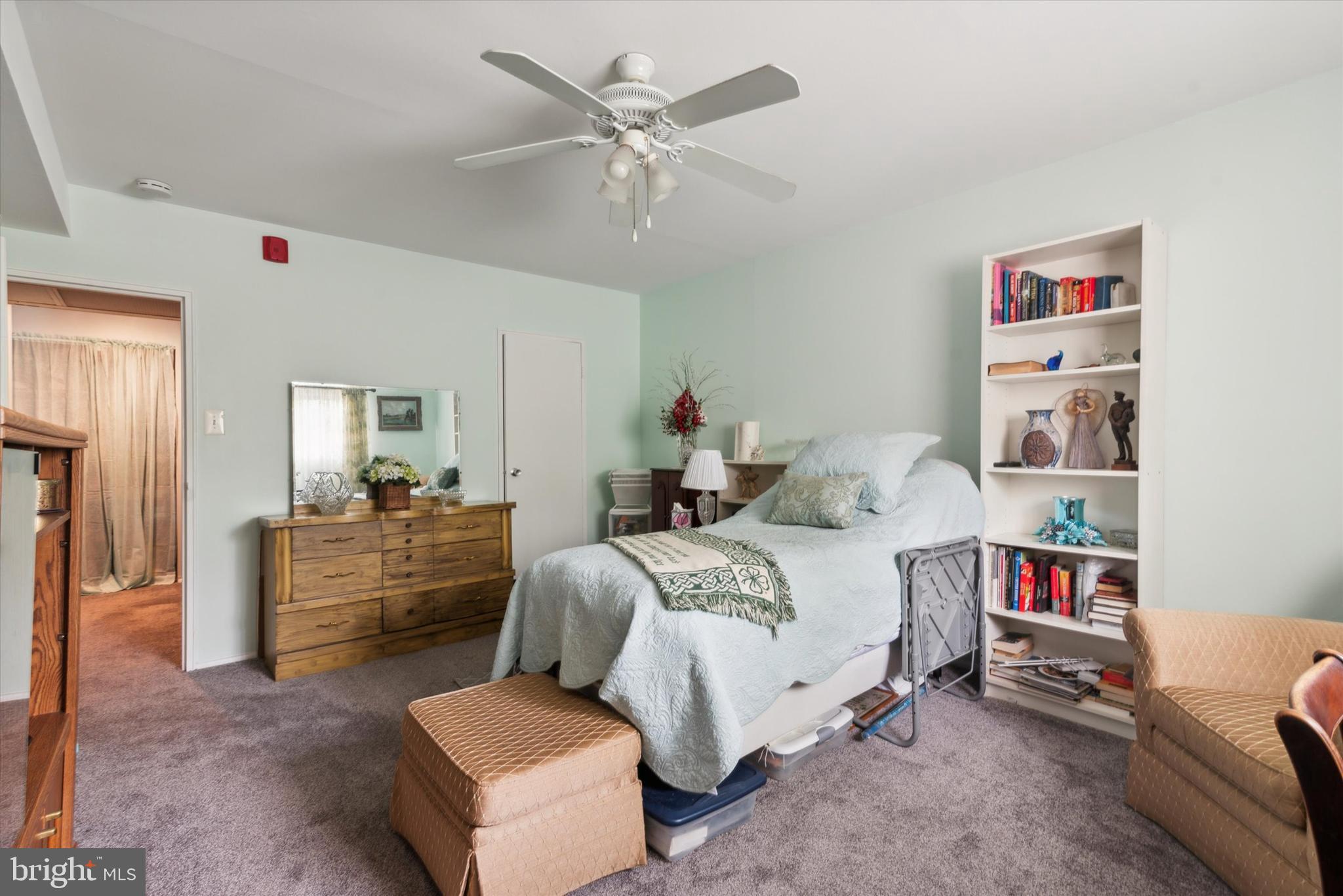 46 Township Line Road, Unit 209 Elkins Park, PA 19027 - Photo 14 of 15 a bed room with a bed and a couch