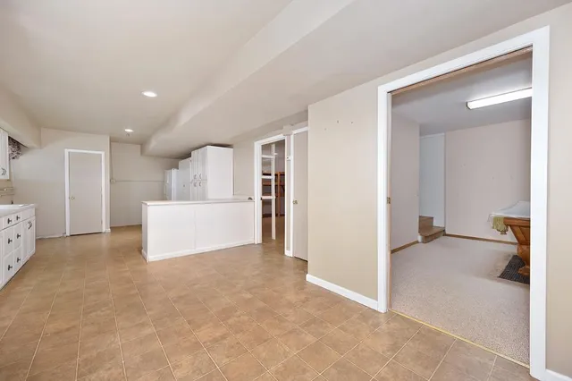 a view of backyard with large trees