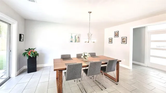 a view of a dining room with furniture