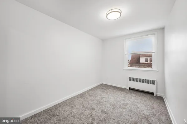 an empty room with closet