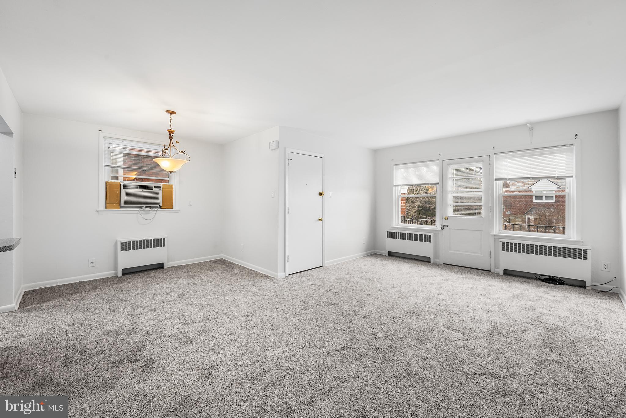 920 Durard Street Philadelphia, PA 19150 - Photo 3 of 16 an empty room with windows and closet