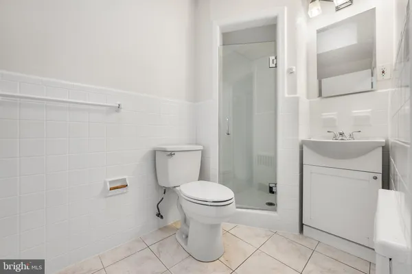 a bathroom with a bathtub and a toilet