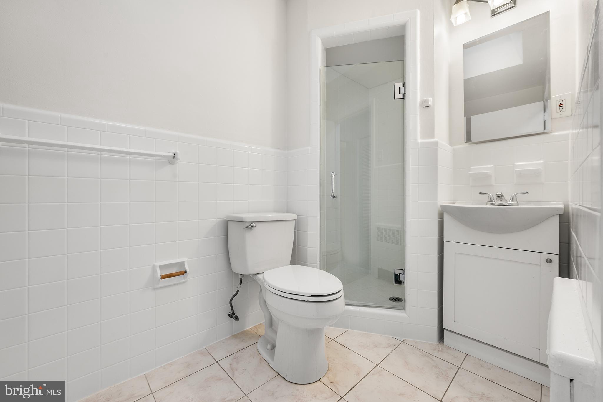 920 Durard Street Philadelphia, PA 19150 - Photo 8 of 16 a bathroom with a toilet sink and shower