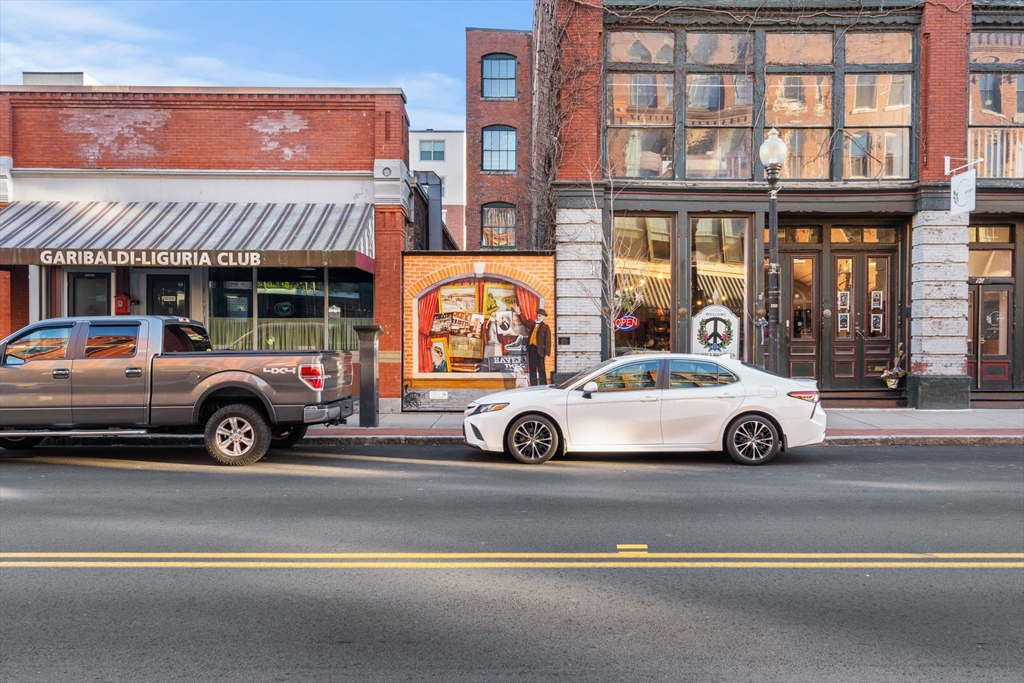 62 Washington Street, Unit 5 Haverhill, MA 01832 - Photo 29 of 34 a view of a car is parked in front of a building