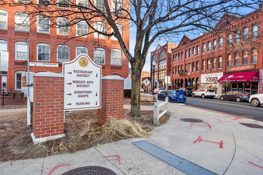 62 Washington Street, Unit 5 Haverhill, MA 01832 - Photo 31 of 34 a front view of a building with parking space