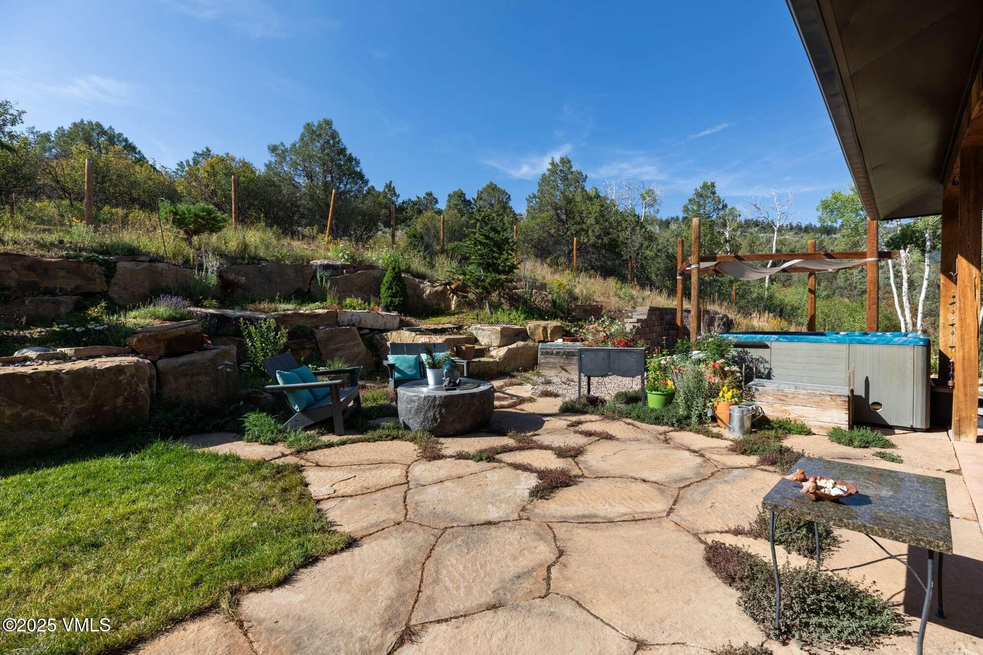 948 Wolcott Springs Road Wolcott, CO 81655 - Photo 14 of 49 a view of a terrace with sitting area