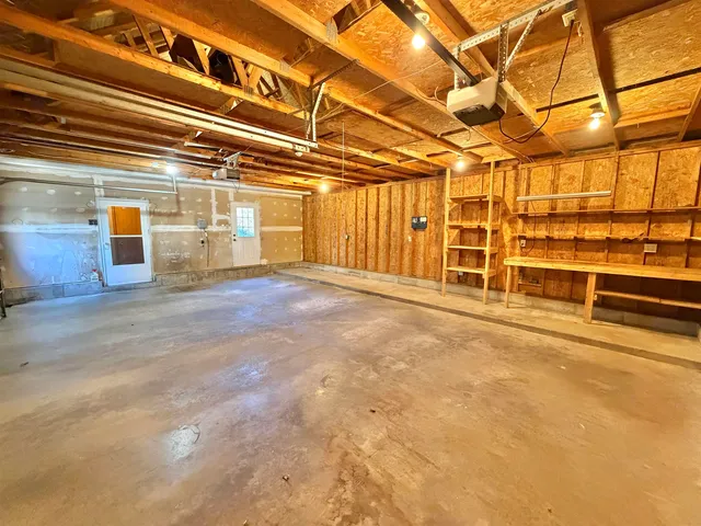 a view of a swimming pool with a yard