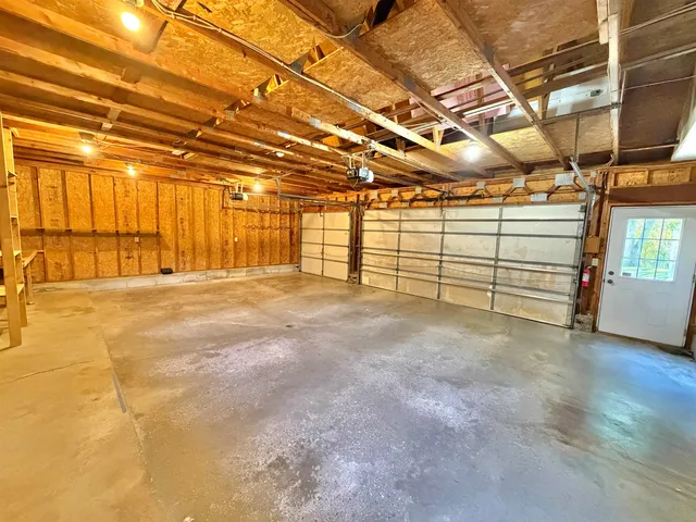 a view of a swimming pool with a yard