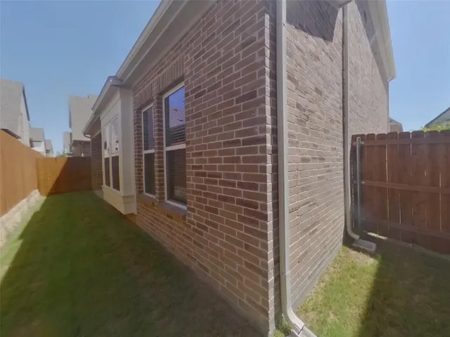 a childrens park with lots of swings and slides