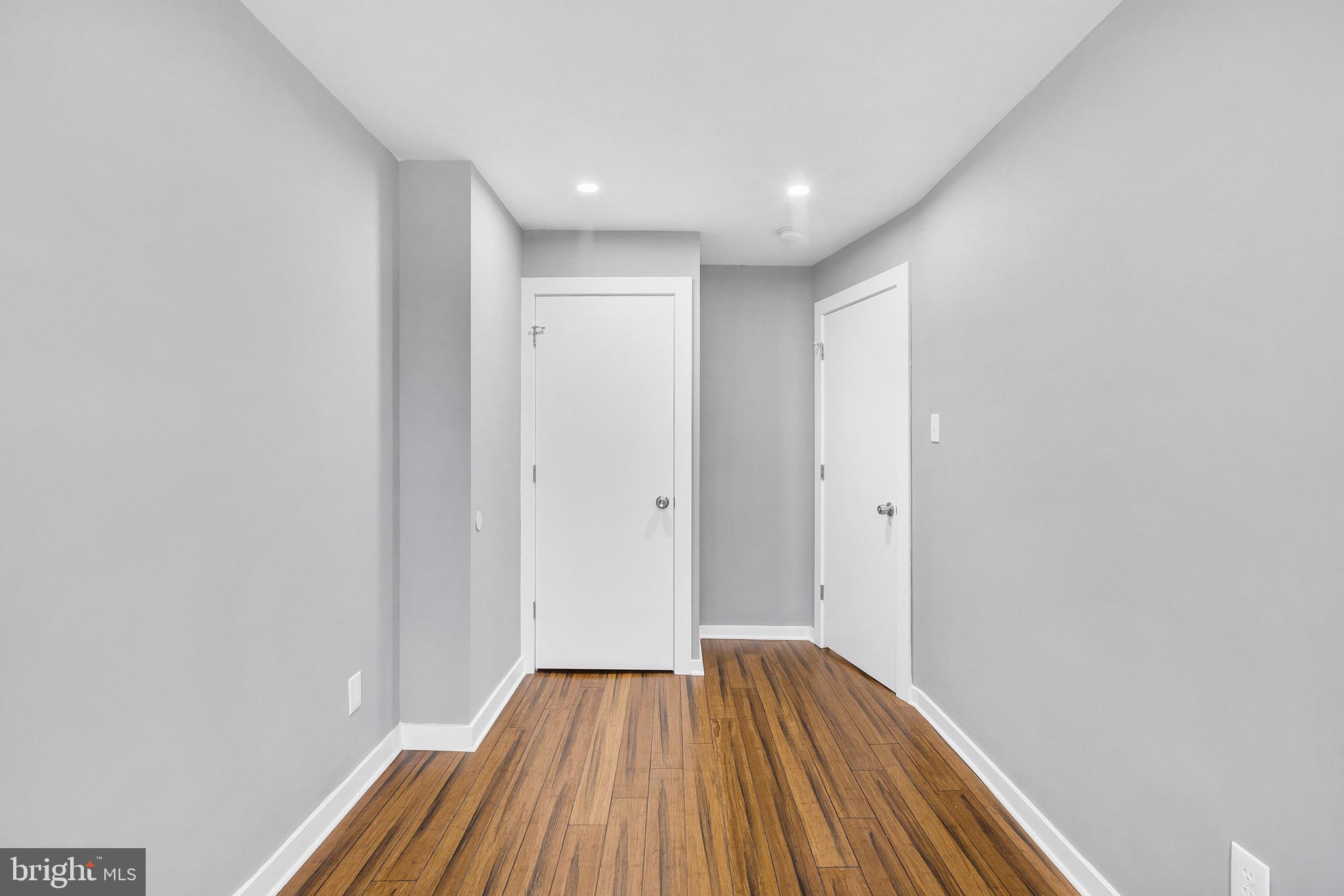 2125 North 20th Street, Unit 2 Philadelphia, PA 19121 - Photo 16 of 20 a view of a hallway with wooden floor