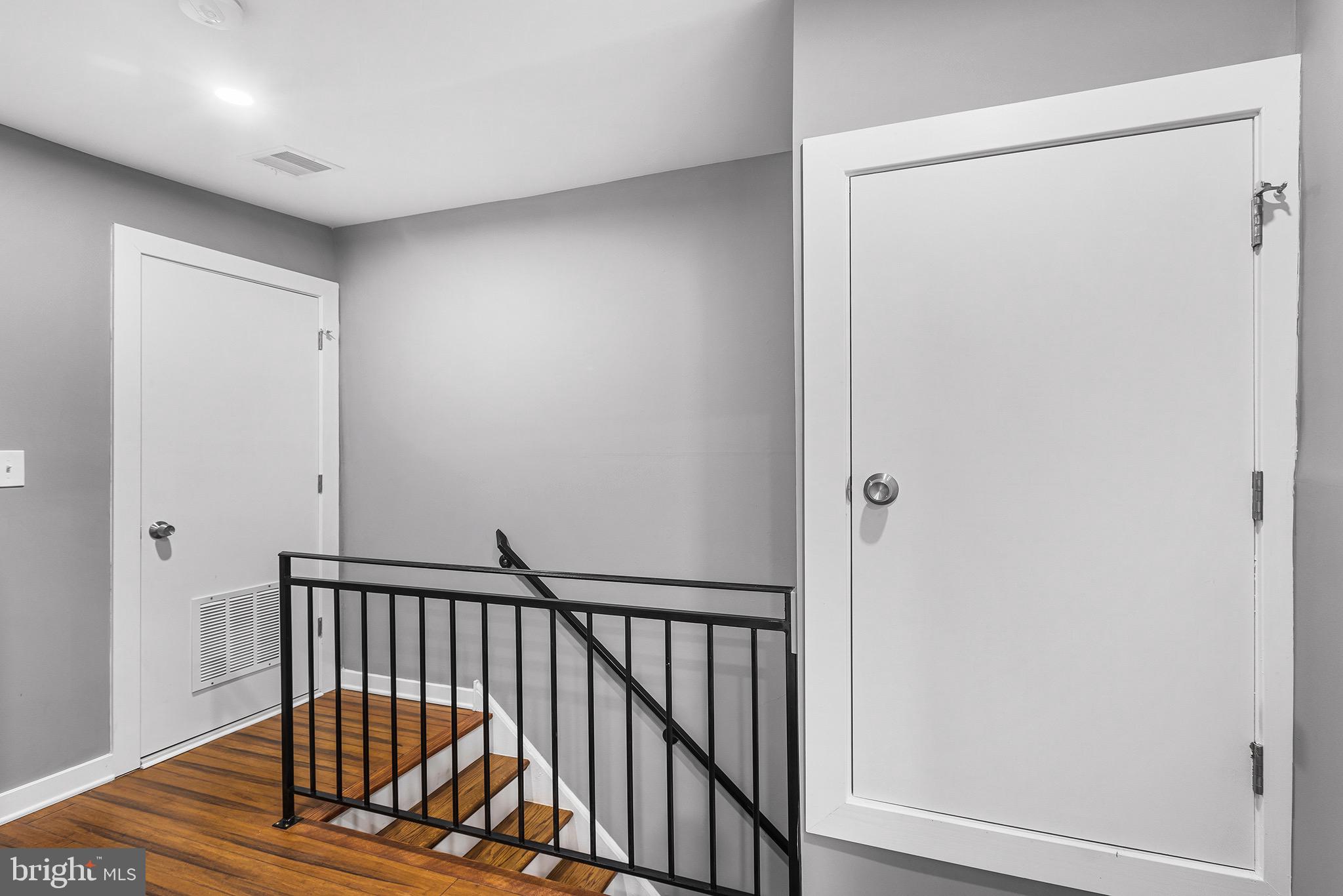 2125 North 20th Street, Unit 2 Philadelphia, PA 19121 - Photo 9 of 20 a view of a hallway with wooden floor