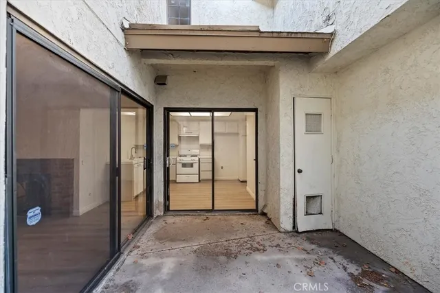 a view of small space with wooden floor