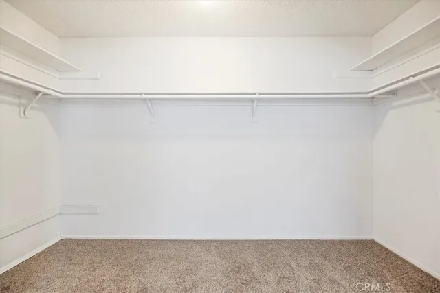 a view of a house with a yard and garage