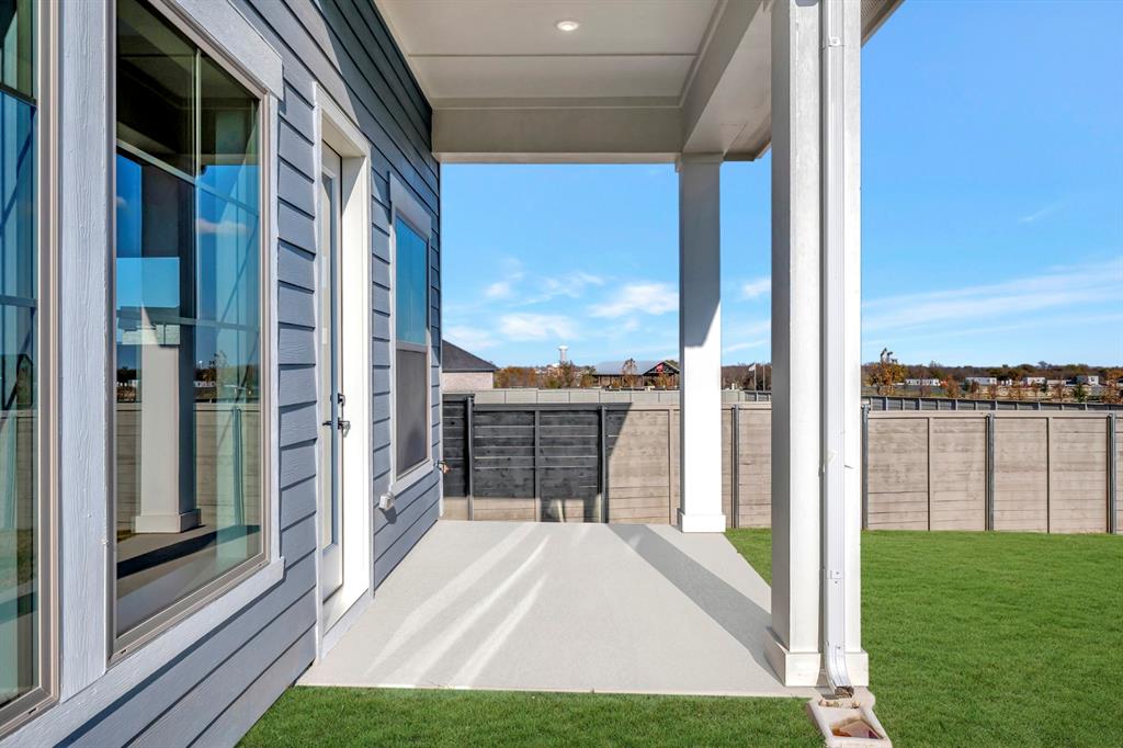 9004 Chestnut Lane Justin, TX 76247 - Photo 2 of 40 a view of balcony with a yard