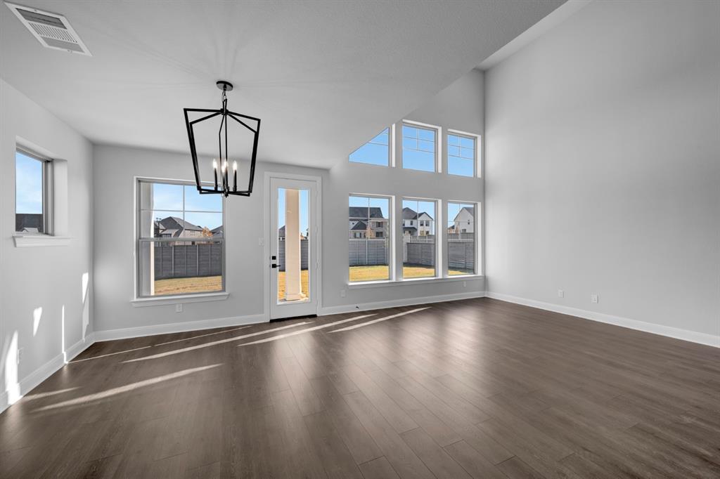 9004 Chestnut Lane Justin, TX 76247 - Photo 30 of 40 a view of livingroom with furniture wooden floor and window