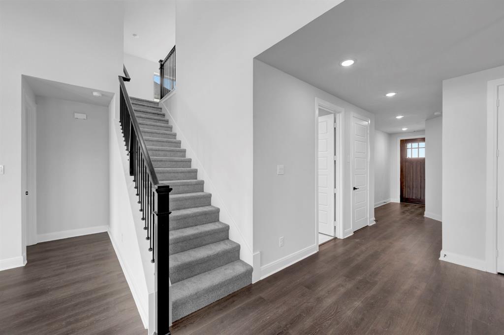 9004 Chestnut Lane Justin, TX 76247 - Photo 31 of 40 a view of a hallway with wooden floor and entryway