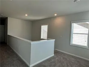 a view of livingroom with washer and dryer