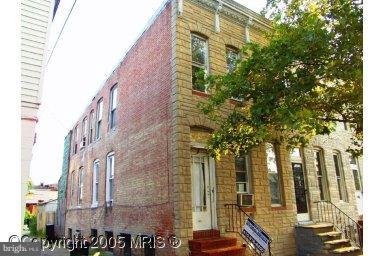 2103 Ramsay Street Baltimore, MD 21223 - Photo 1 of 1 a view of a tall building
